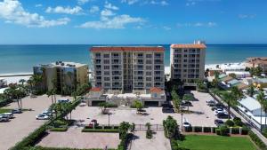 an aerial view of a resort with the ocean at La Vistana #A503 in St Pete Beach