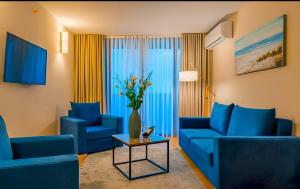 Posezení v ubytování ORBI CITY - Lovely Apartments