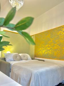 Ένα ή περισσότερα κρεβάτια σε δωμάτιο στο Homely Nook Prague Centre