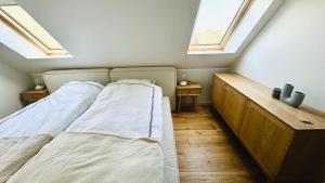 Ένα ή περισσότερα κρεβάτια σε δωμάτιο στο Jaani Mardi Puhkemaja