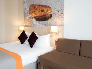 Ένα ή περισσότερα κρεβάτια σε δωμάτιο στο Mercure Gdańsk Posejdon +115 φωτογραφίες