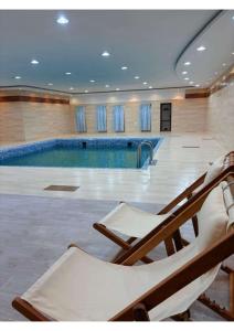 Swimmingpoolen hos eller tæt på منتجع ايلين السياحي