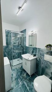 Et badeværelse på Felicia Apartments