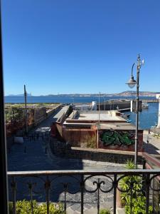 a view of a canal from a balcony at Sea Vibes I FLOOR in Portici +14 photos