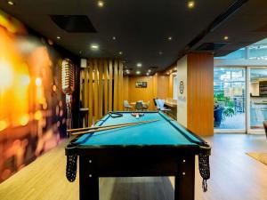 a billiard room with a pool table in it at ibis Sao Paulo Congonhas in Sao Paulo