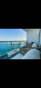 a bedroom with a bed and a view of the water at I bedroom luxury in Cartagena in Cartagena de Indias