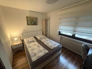 Postel nebo postele na pokoji v ubytování Restaurant Motel Friesdorfer Hof