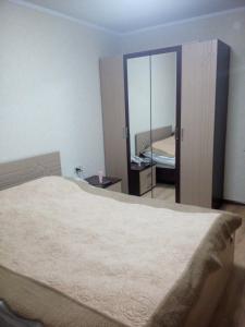 Säng eller sängar i ett rum på Ana Apartment at Orbi