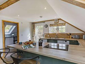 a kitchen with a wooden counter top in a room at 1 Bed in Launceston 86674 in North Petherwin