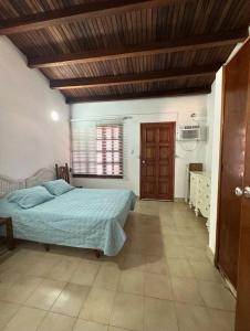 Postel nebo postele na pokoji v ubytování Town House en Playa el Agua - Isla de Margarita