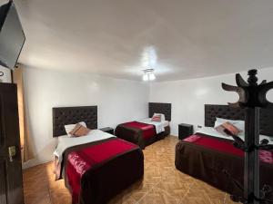 Ένα ή περισσότερα κρεβάτια σε δωμάτιο στο Redys House