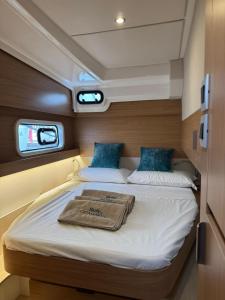 a bed in the back of a boat at Sicily by Catamaran in Palermo