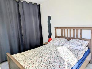 Postel nebo postele na pokoji v ubytování Charmante maison de village