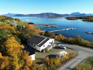 an aerial view of a marina on a lake at Arctic Wonderland in Senja