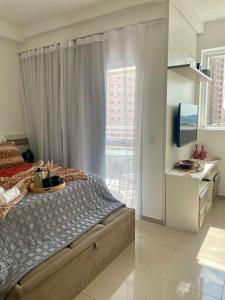 En eller flere senge i et værelse på LoftPrime Experience Piscina Sauna & Wi-Fi Ultra Rápido