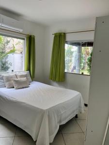 Postel nebo postele na pokoji v ubytování Casa com piscina privativa condomínio , Barra do Jacuipe + 89 fotografií