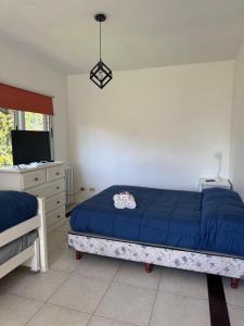 Voodi või voodid majutusasutuse Hermoso depto cercano a hospital austral y usal toas +9 fotot