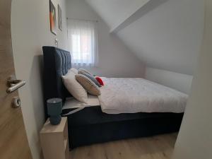 Voodi või voodid majutusasutuse Apartman VIENTO 18 Zlatibor toas