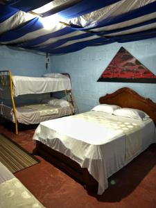 Postel nebo postele na pokoji v ubytování Finca la fabiola