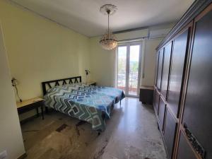 Postel nebo postele na pokoji v ubytování La casa di Maria e Giuseppe + 1 fotografie