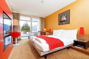 Krevet ili kreveti u jedinici u okviru objekta Post Hotel Weggis