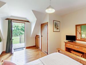 En eller flere senge i et værelse på 3 Bed in Clovelly BURFL