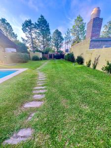 Κήπος έξω από το Casa familiar en Roldán ideal descanso