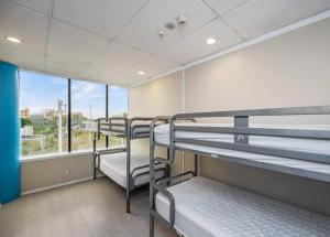 Ένα ή περισσότερα κρεβάτια σε δωμάτιο στο Stars Hostel