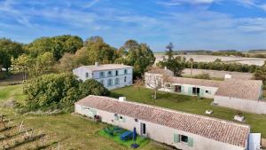 an aerial view of a house with a yard at Domaine de Kiba in Barzan