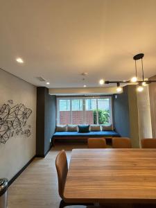 Un lugar para sentarse en Studio aconchegante de 1 quarto com vaga grátis - 10min do Allianz Parque 112 fotos más