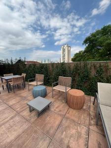 Un balcón o terraza en Studio aconchegante de 1 quarto com vaga grátis - 10min do Allianz Parque