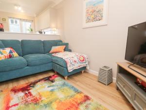 Et tv og/eller underholdning på Jaspers Retreat, formerly known as Starfish Cottage