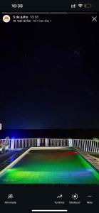 a view of a bowling alley at night at Villa carnaúbas in Pedro II