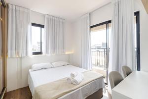 Ένα ή περισσότερα κρεβάτια σε δωμάτιο στο One House – Academia, Piscina e Coworking | Gonzaga Stays +35 φωτογραφίες