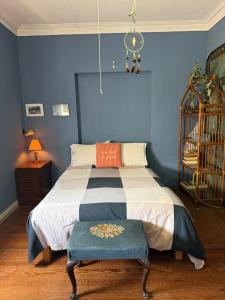 Ένα ή περισσότερα κρεβάτια σε δωμάτιο στο Miraflores Moonlight B&B