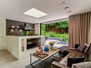 a living room with a couch and a fireplace at 2 Bed in Elslack 86230 in Elslack +17 photos