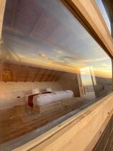 a view of a bedroom through a window at La Pointe d'Or Hotel Dakhla in Dakhla +2 photos