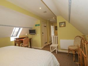 Et tv og/eller underholdning på Wash House Cottage