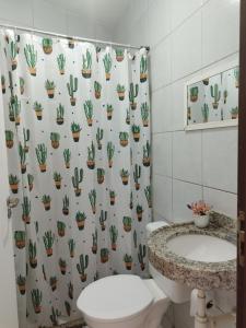 Koupelna v ubytování Duplex com piscina e churrasqueira + 17 fotografií