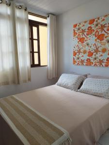 Postel nebo postele na pokoji v ubytování Duplex com piscina e churrasqueira