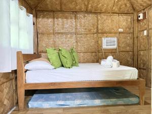 Postel nebo postele na pokoji v ubytování Nanay Santa's Garden Beach Resort