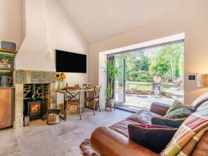 a living room with a couch and a fireplace at 1 Bed in Durham 89318 in Witton Gilbert