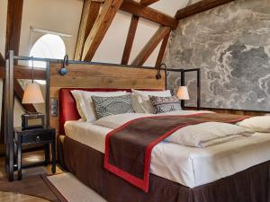 Postel nebo postele na pokoji v ubytování PEST-BUDA Design Hotel