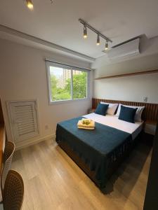 Postel nebo postele na pokoji v ubytování Studio perto do Allianz Parque - estacionamento e piscina