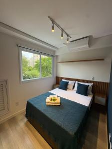 Postel nebo postele na pokoji v ubytování Studio perto do Allianz Parque - estacionamento e piscina