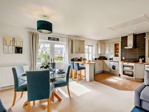 a kitchen and dining room with a table and chairs at 1 bed property in Harrogate North Yorkshire HH097 in Harrogate +11 photos