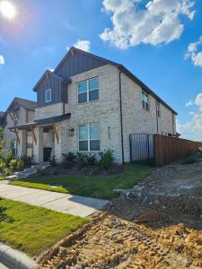 a house being built on the side of a street at Talia Heaven in Mesquite