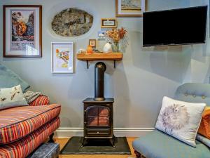 Televiisor ja/või meelelahutuskeskus majutusasutuses 1 Bed in Leyburn 95072