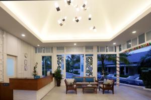 a living room with a ceiling with a chandelier at Tuana Hotels Brook Pool Access in Chalong  +149 photos