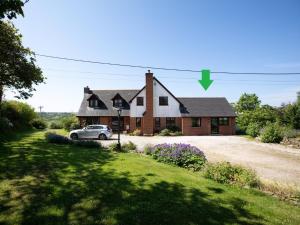 a house with a car parked in front of it at 1 bed in Bude 83632 in Stratton